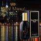 Royal Mirage Night cologne bottle and packaging with a cityscape background