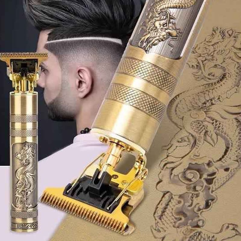 Gold and silver hair trimmer with detailed design, man with styled haircut in the background